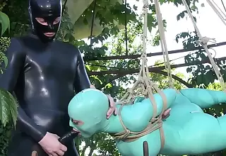 Latex pipedream for a hot woman enduring the dick here ropes